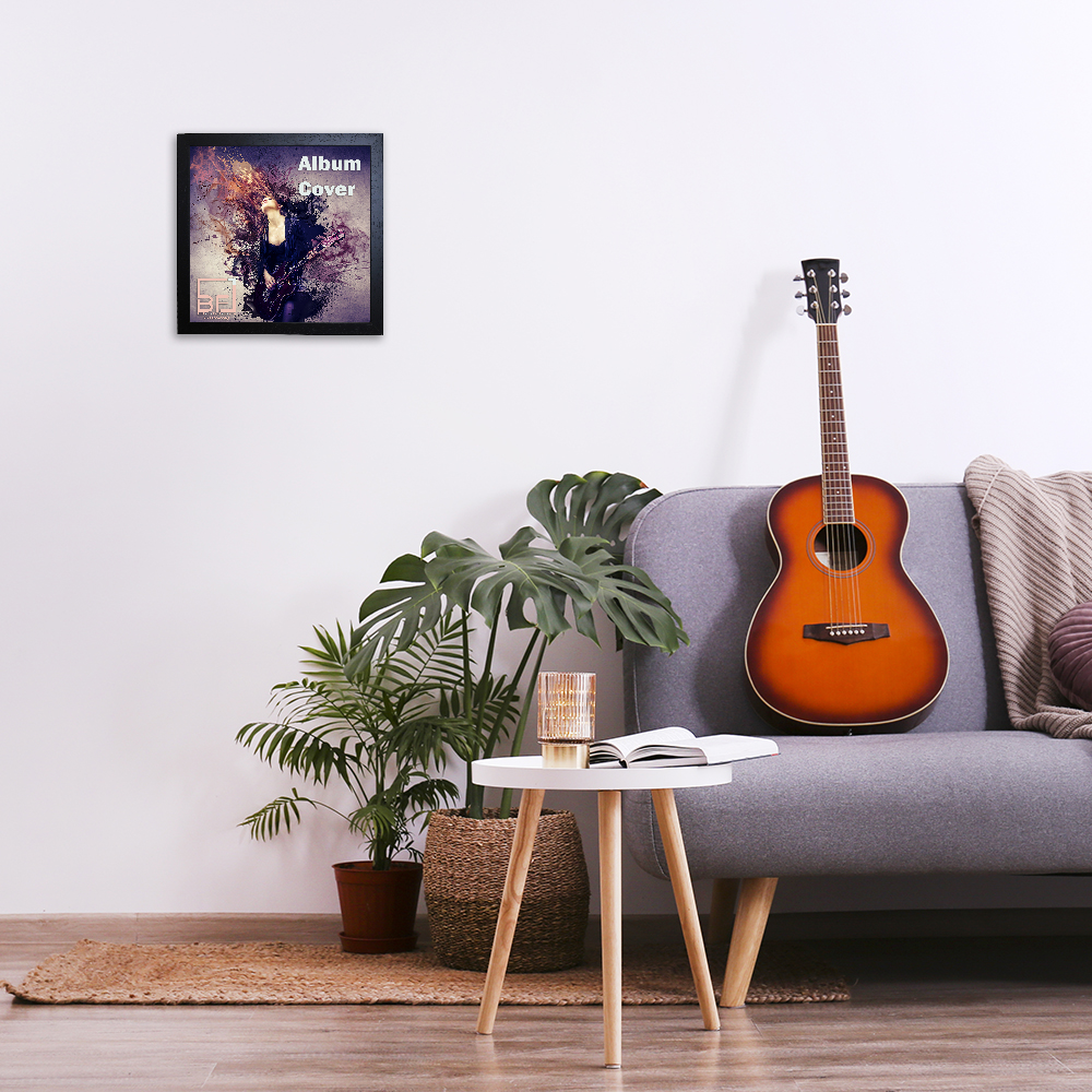 Minimalistic interior design concept. Acoustic guitar on grey textile sofa in spacious room of loft style apartment with wood textured laminated flooring. Background, copy space, close up.