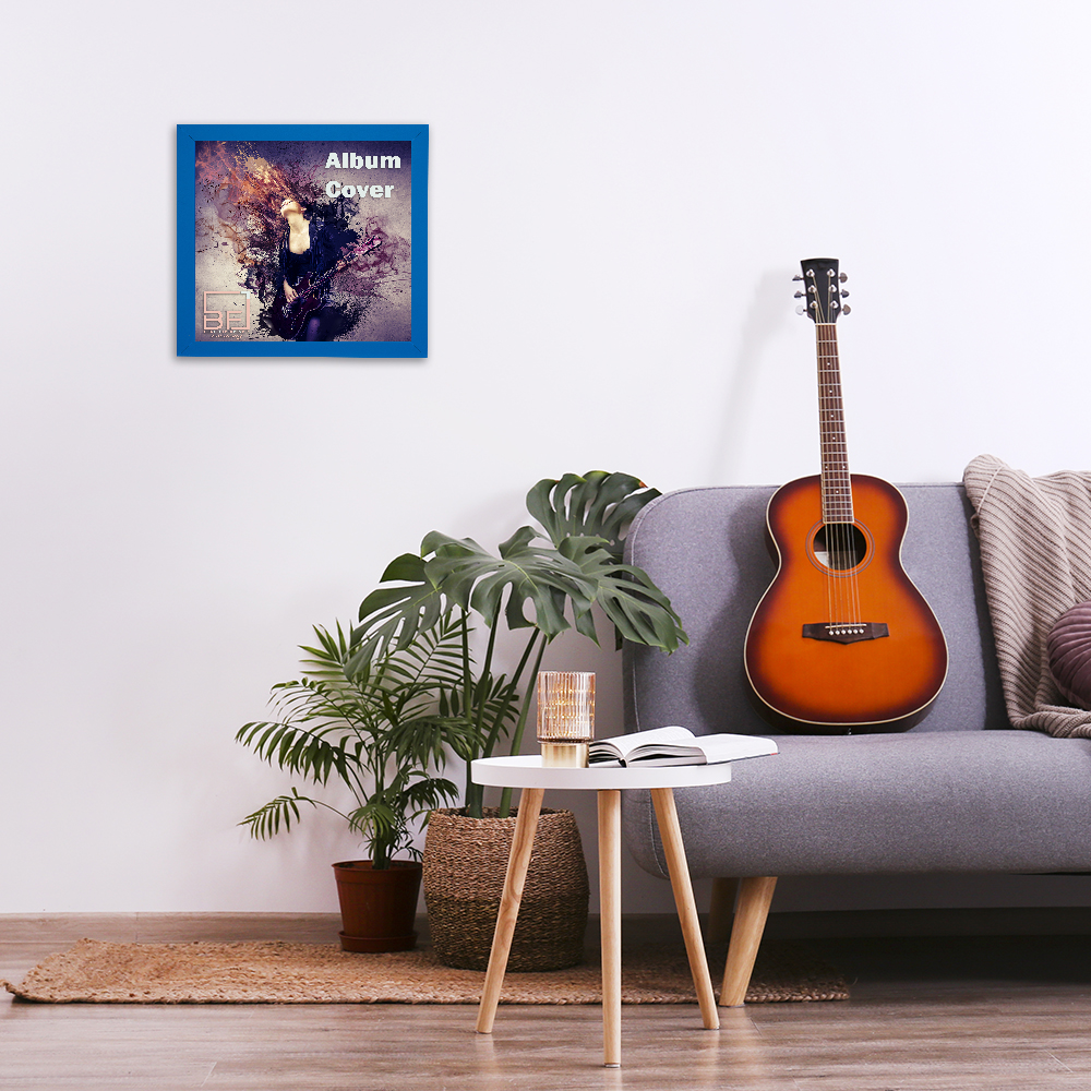 Minimalistic interior design concept. Acoustic guitar on grey textile sofa in spacious room of loft style apartment with wood textured laminated flooring. Background, copy space, close up.