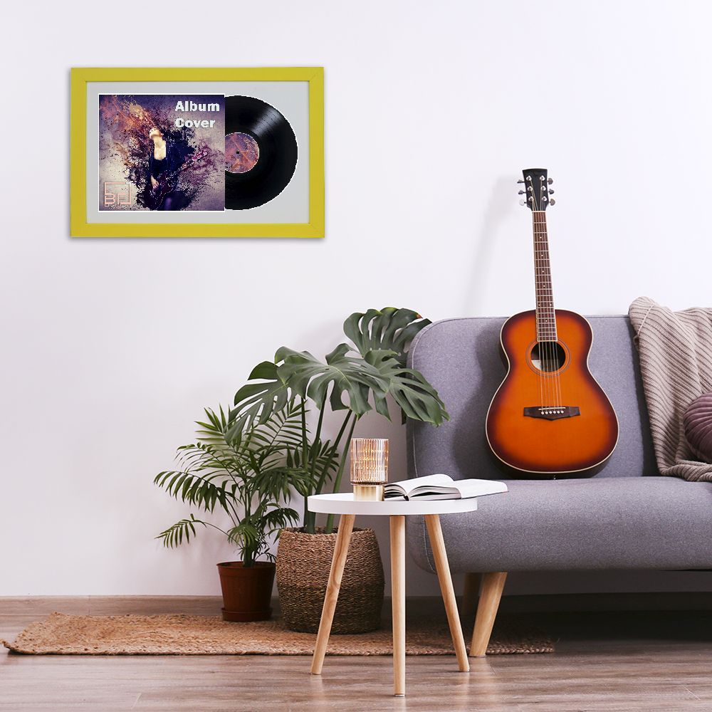 Minimalistic interior design concept. Acoustic guitar on grey textile sofa in spacious room of loft style apartment with wood textured laminated flooring. Background, copy space, close up.