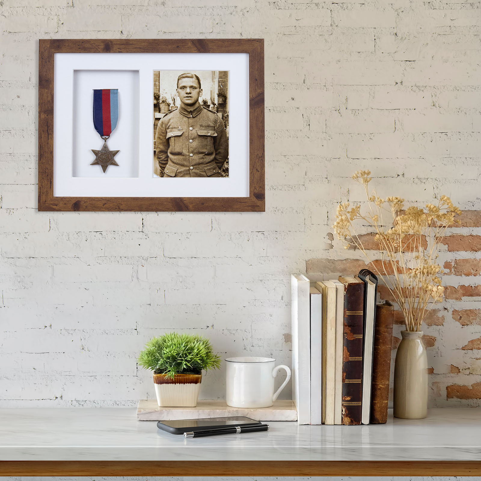 Marble desk with books, coffee mug, mobile phone and plant. Mock up