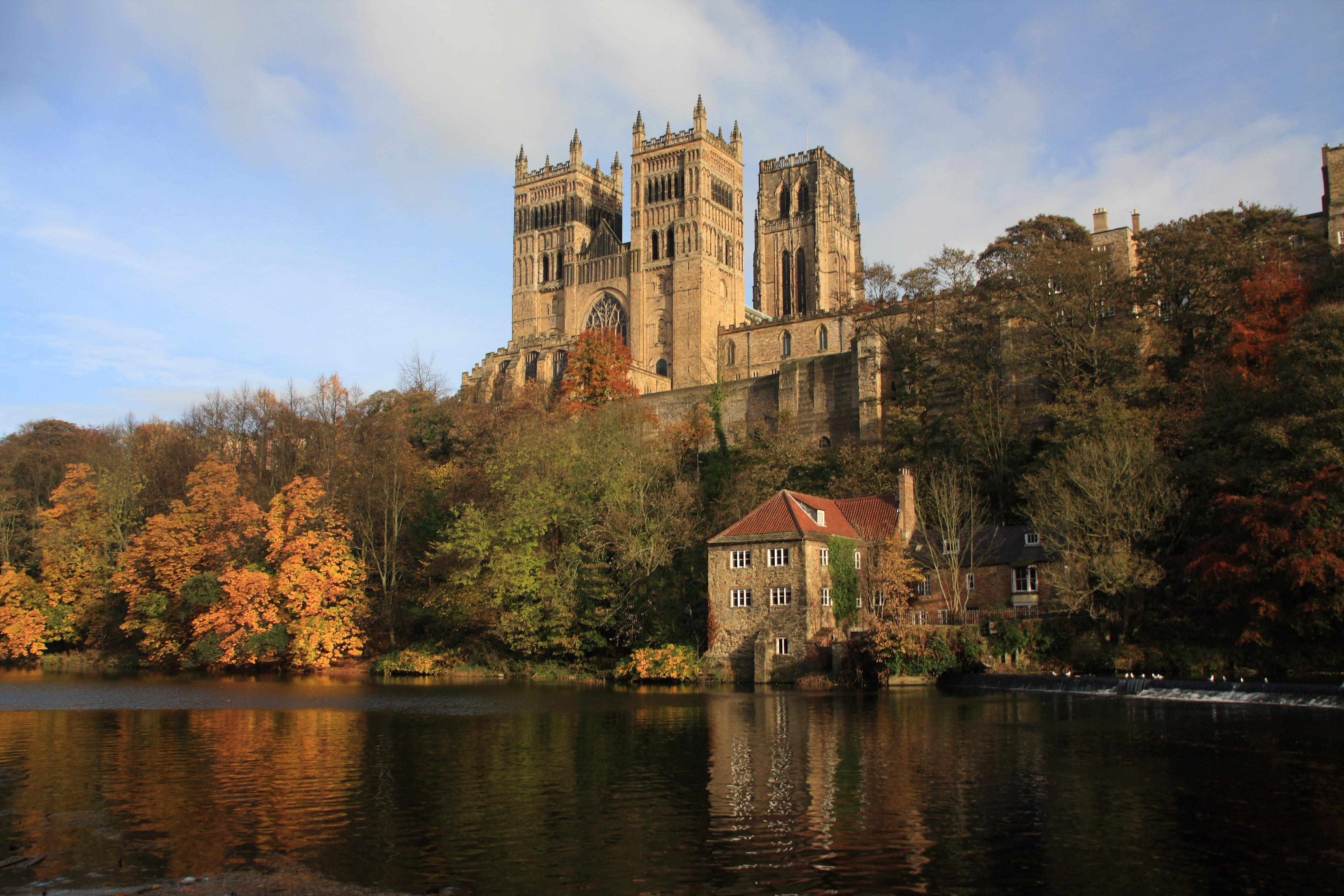 Historic castle by tranquil river